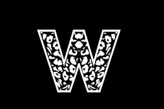White letter W with ornate floral pattern fill on black background